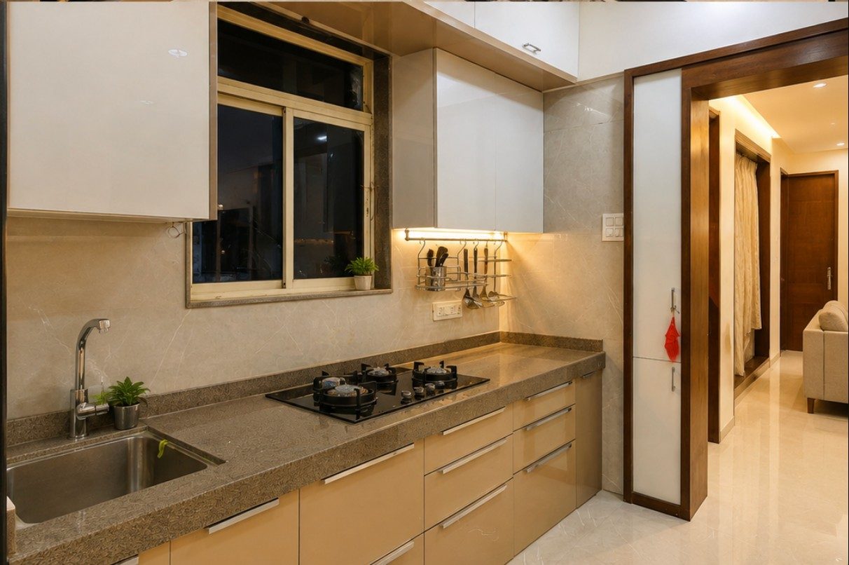 Modular kitchen with a stone counter and a hob run under the window — 3 BHK duplex, Baner, by Twin Space Studio